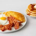 Four Bacon Strips & Eggs